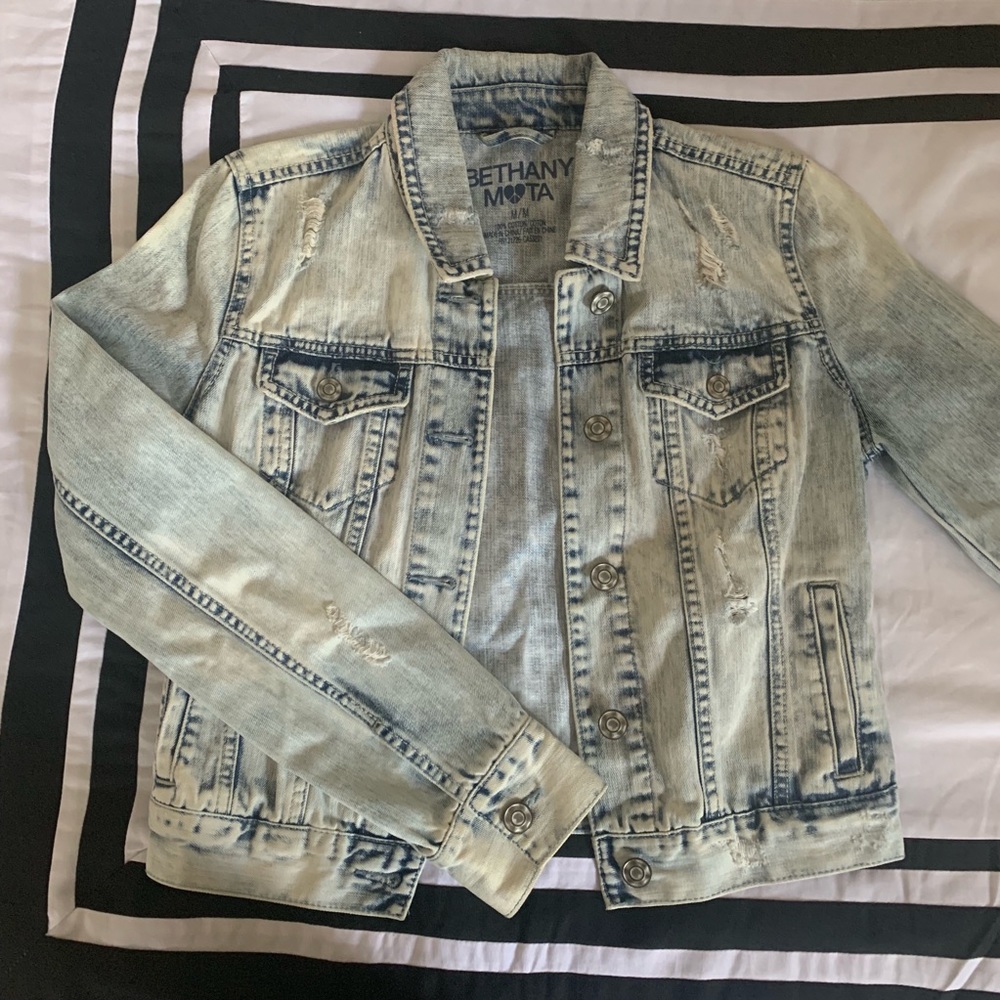Distressed denim jacket